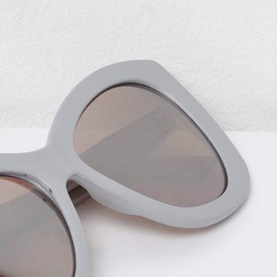 Light grey cat eye sunglasses